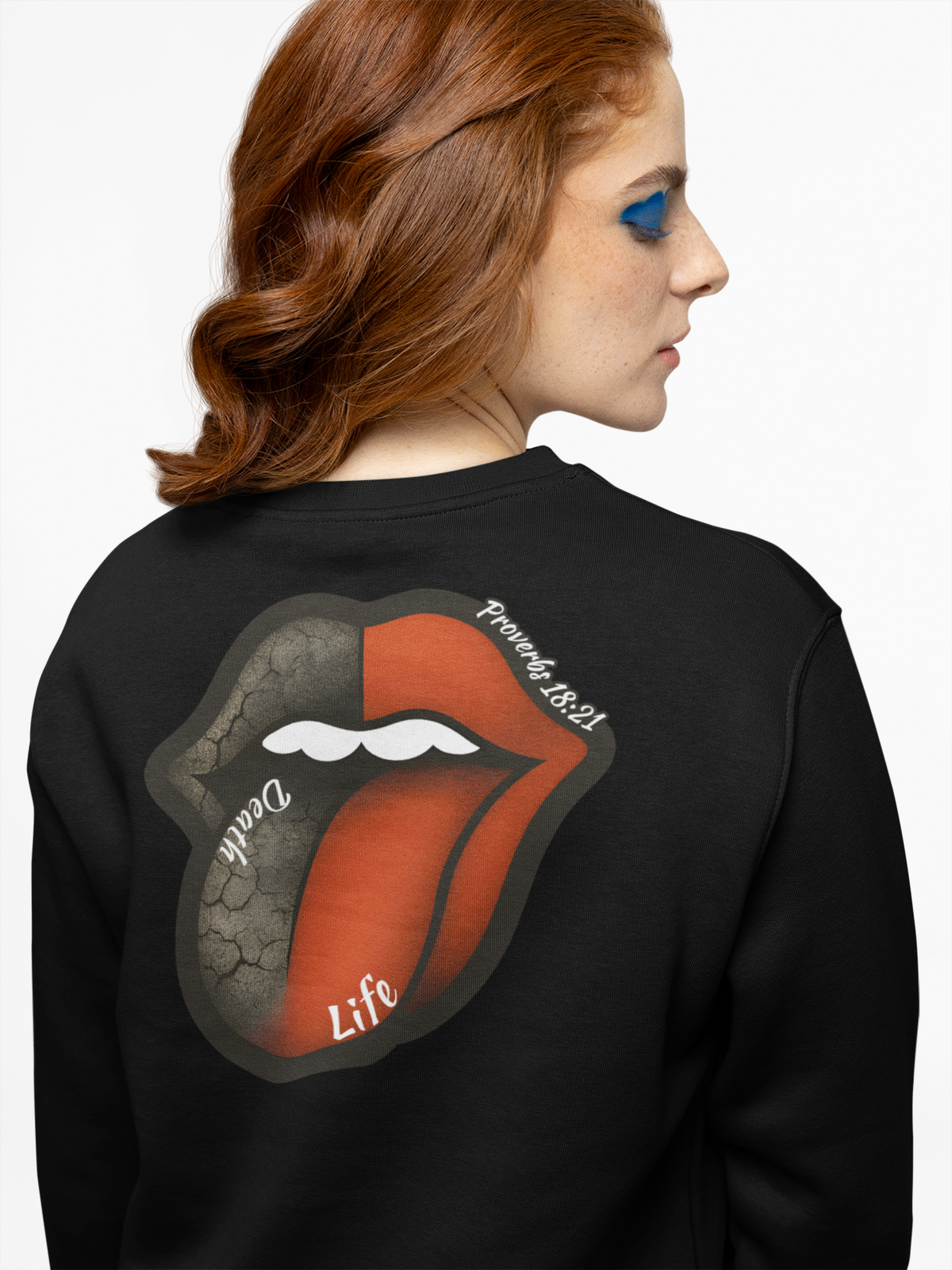 Person wearing a black sweatshirt with a graphic design on the back, featuring a stylized tongue and lips.