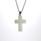 Glow in the dark cross necklace on stainless steel chain
Minimal Christian cross pendant necklace
Cross necklace with soft glow photographed on white background