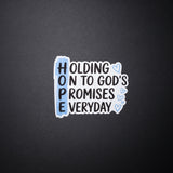 Blue and white HOPE Christian sticker spelling Holding On To Gods Promises Everyday with hearts on a dark background