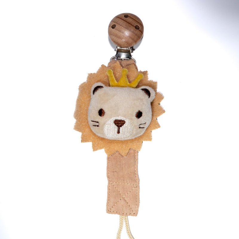Baby pacifier clip featuring a soft plush lion with a small crown, fabric strap, and wooden clip on a white background, designed for babies and toddlers