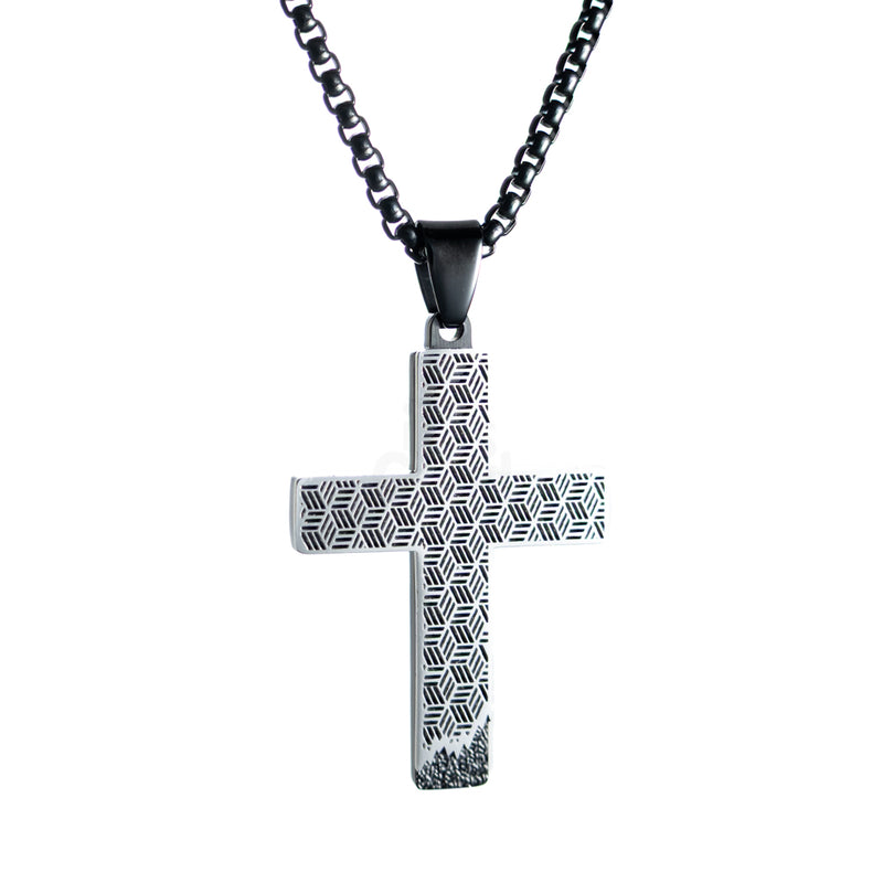 Rubric Cross Necklace with geometric cutout pattern on stainless steel cross pendant, black chain, front view on white background.