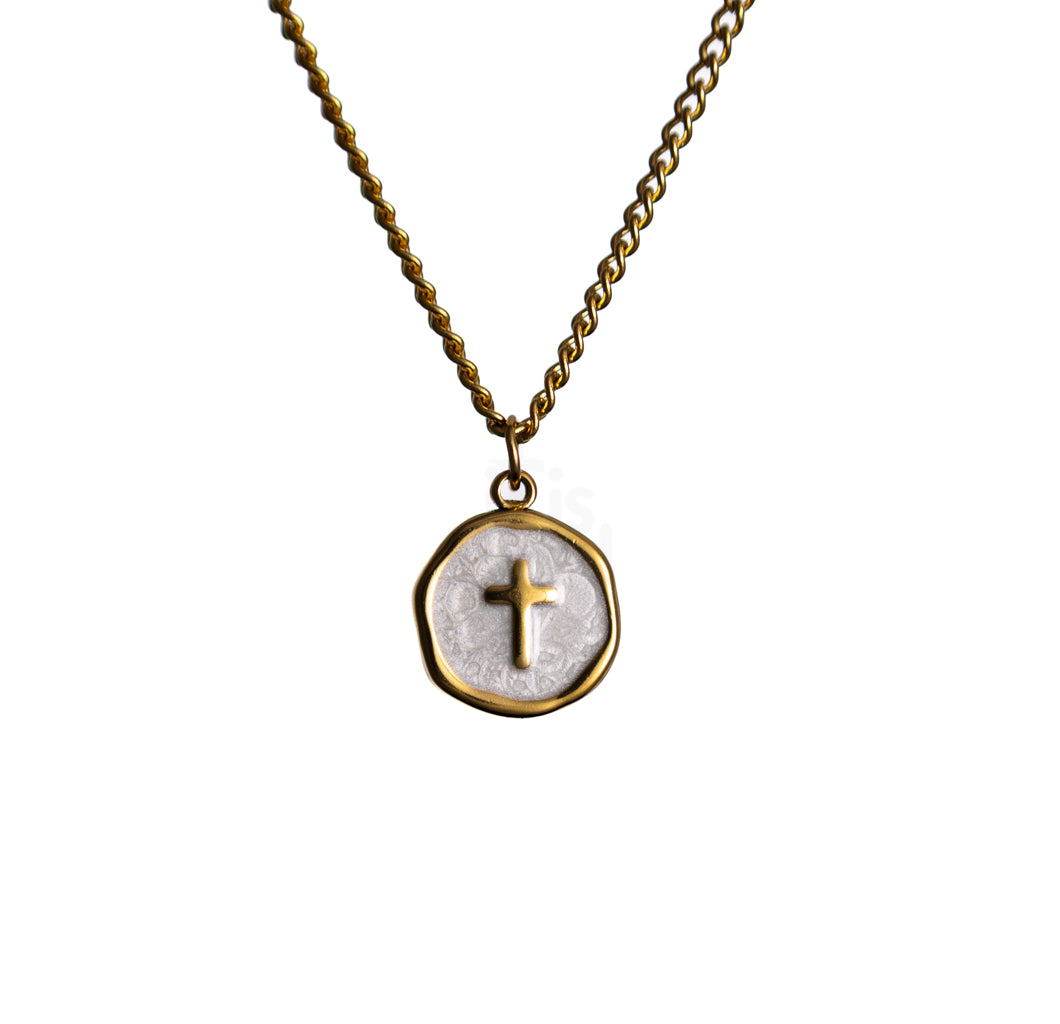 Gold chain necklace with round White pendant featuring a small cross at the center on a white background