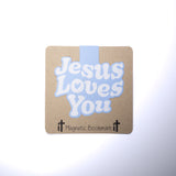 Double sided magnetic bookmark featuring the phrase Jesus Loves You in soft blue lettering on a kraft style background, designed for Christian reading and Bible study