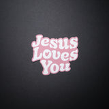 Muave Jesus Loves You Christian sticker with bubble letters on dark background