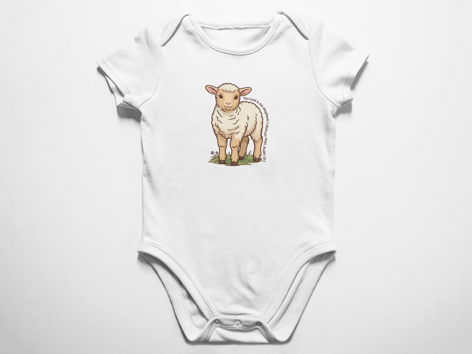 A clean flat lay view of a white baby onesie featuring a beautifully illustrated lamb and the text The Lord is my shepherd I shall not want Psalm 23 against a white background.